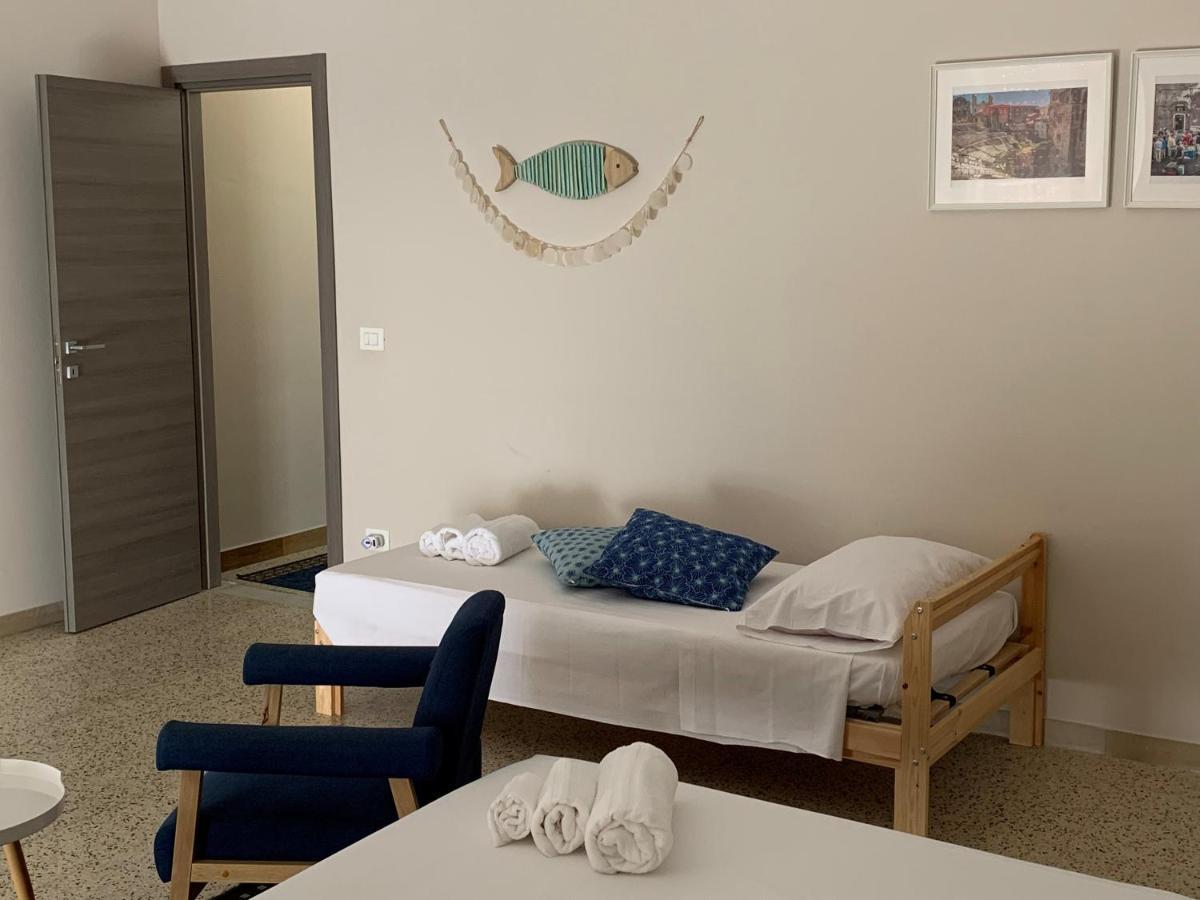 Mita Apartments Catania Bagian luar foto